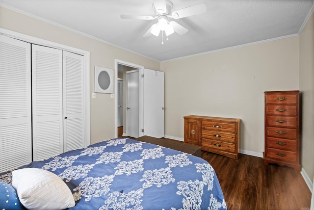 1903 W Arch Ave, Searcy, AR 72143 - bedroom featuring wood finished floors, a closet, ornamental molding, and a ceiling fan