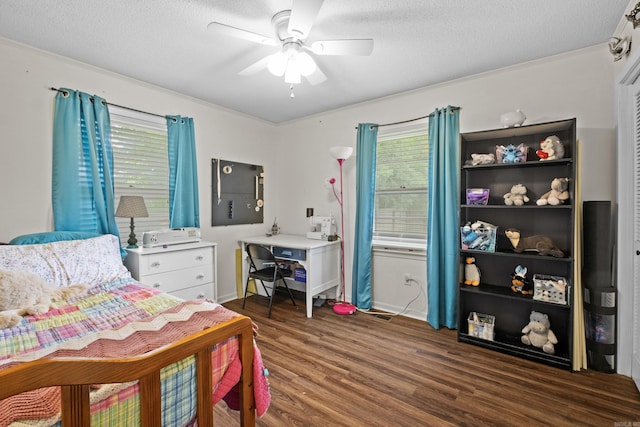 1903 W Arch Ave, Searcy, AR 72143 - bedroom with wood finished floors, a textured ceiling, and ceiling fan