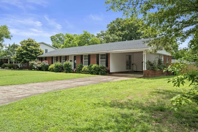 1903 W Arch Ave, Searcy, AR 72143 - ranch-style house featuring driveway, brick siding, a front yard, and a carport