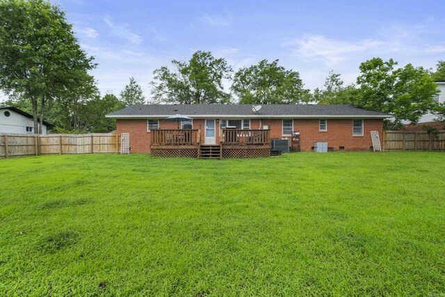 1903 W Arch Ave, Searcy, AR 72143 - back of house with a fenced backyard, a wooden deck, brick siding, and crawl space