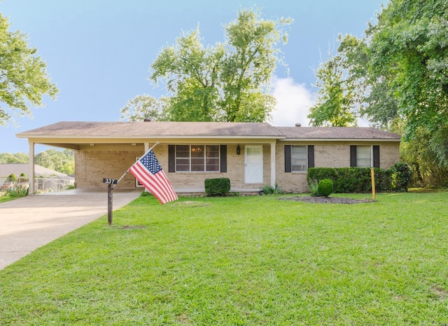 337 Lance Cir, Hot Springs, AR 71901 - ranch-style home featuring brick siding, driveway, a front yard, and a carport