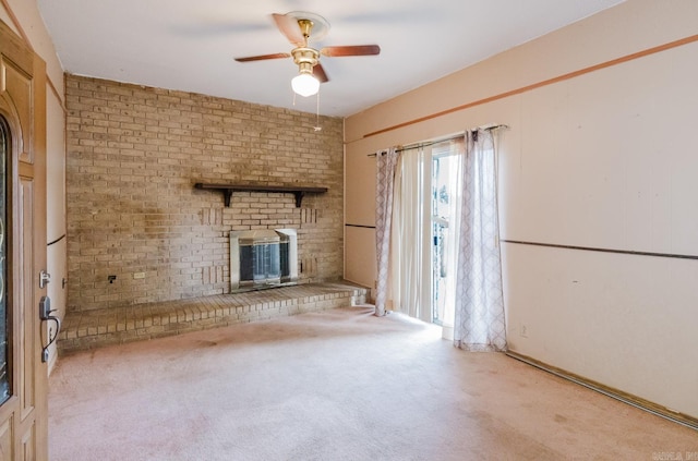 337 Lance Cir, Hot Springs, AR 71901 - unfurnished living room featuring ceiling fan, a brick fireplace, and carpet flooring