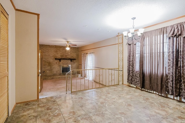 337 Lance Cir, Hot Springs, AR 71901 - unfurnished living room with a chandelier, a ceiling fan, and a brick fireplace