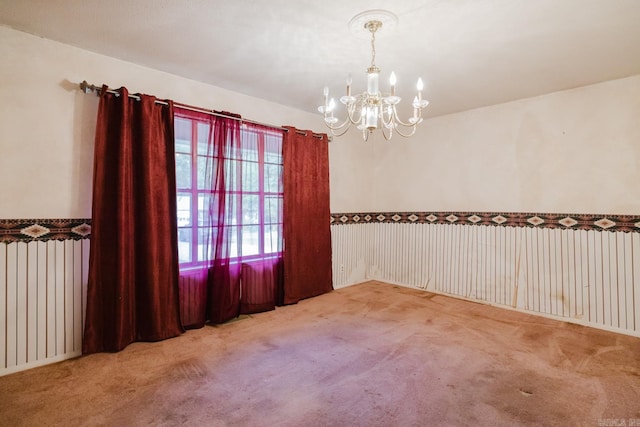 337 Lance Cir, Hot Springs, AR 71901 - empty room featuring radiator heating unit, carpet, and a chandelier