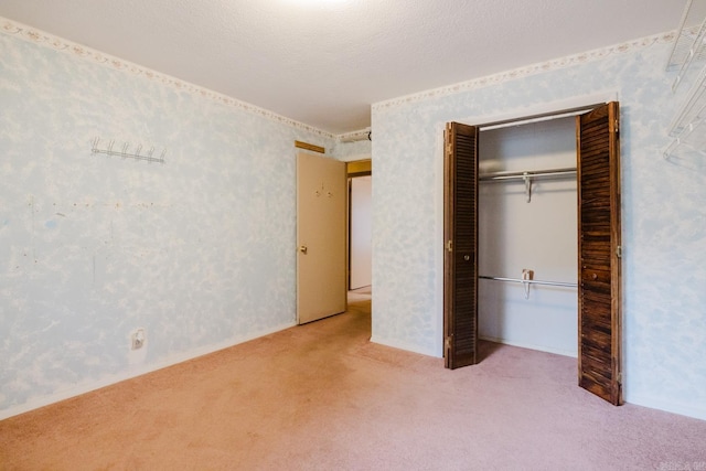 337 Lance Cir, Hot Springs, AR 71901 - unfurnished bedroom with carpet flooring, a closet, and wallpapered walls