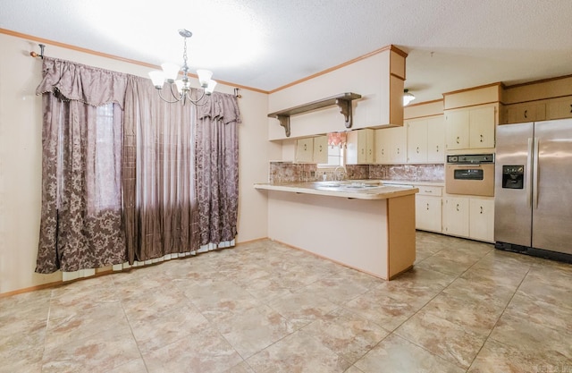 337 Lance Cir, Hot Springs, AR 71901 - kitchen featuring stainless steel fridge with ice dispenser, oven, a chandelier, light countertops, and crown molding