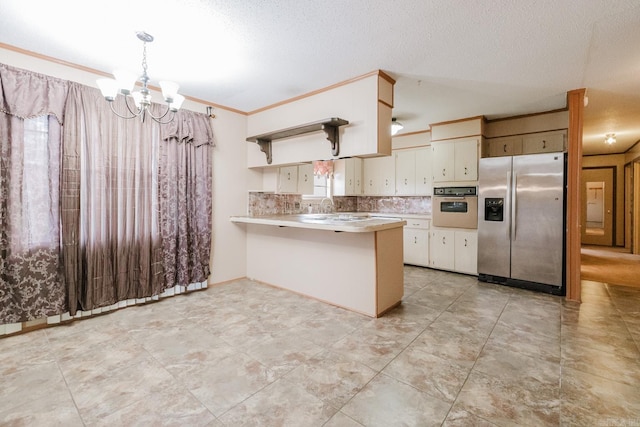 337 Lance Cir, Hot Springs, AR 71901 - kitchen featuring stainless steel refrigerator with ice dispenser, wall oven, a chandelier, light countertops, and a peninsula