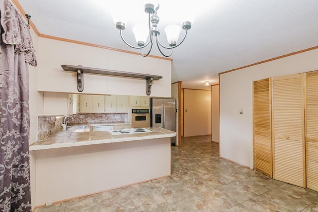 337 Lance Cir, Hot Springs, AR 71901 - kitchen featuring white appliances, a peninsula, crown molding, a chandelier, and tile counters