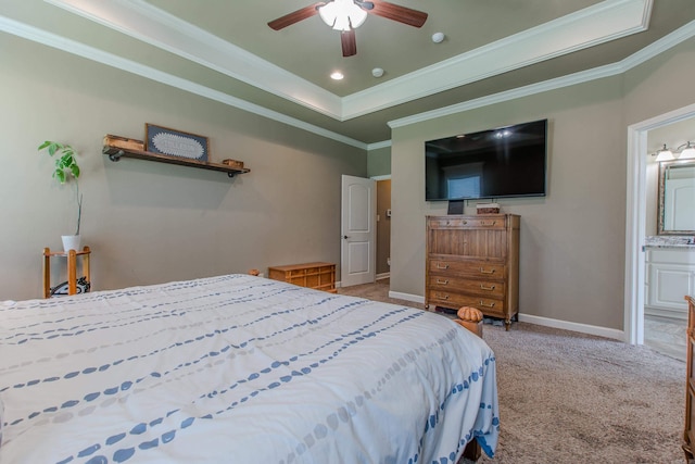 2148 Avondale Dr, Benton, AR 72019 - carpeted bedroom with ornamental molding, a tray ceiling, ensuite bathroom, and ceiling fan