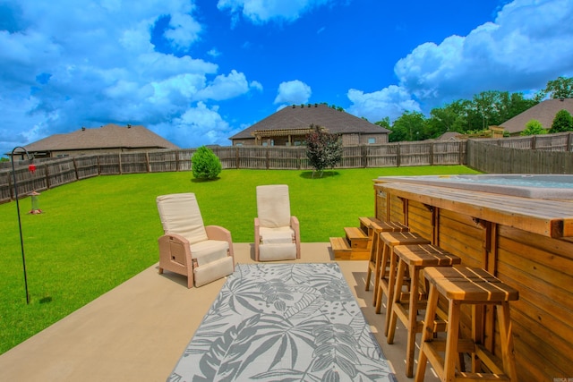 2148 Avondale Dr, Benton, AR 72019 - fenced backyard with a patio and a jacuzzi