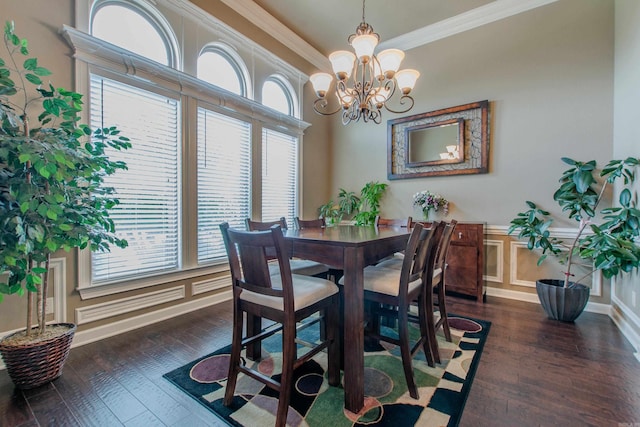 2148 Avondale Dr, Benton, AR 72019 - dining space with ornamental molding, dark wood-style flooring, a chandelier, a wainscoted wall, and a decorative wall