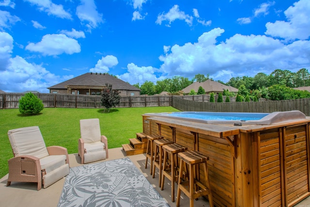 2148 Avondale Dr, Benton, AR 72019 - fenced backyard with a patio area