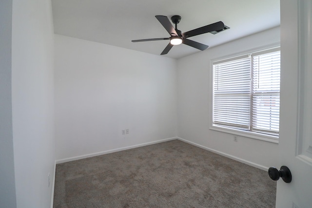 1206 Ryan Ln, Paragould, AR 72450 - spare room featuring plenty of natural light, ceiling fan, and carpet