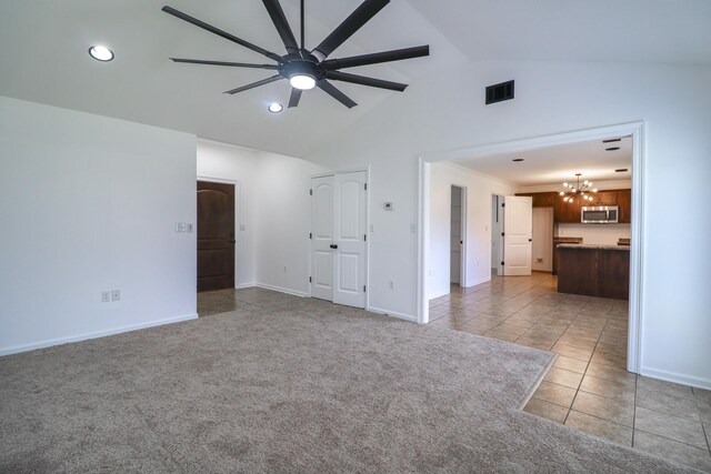 1206 Ryan Ln, Paragould, AR 72450 - unfurnished living room featuring a chandelier, a ceiling fan, light tile patterned flooring, high vaulted ceiling, and recessed lighting