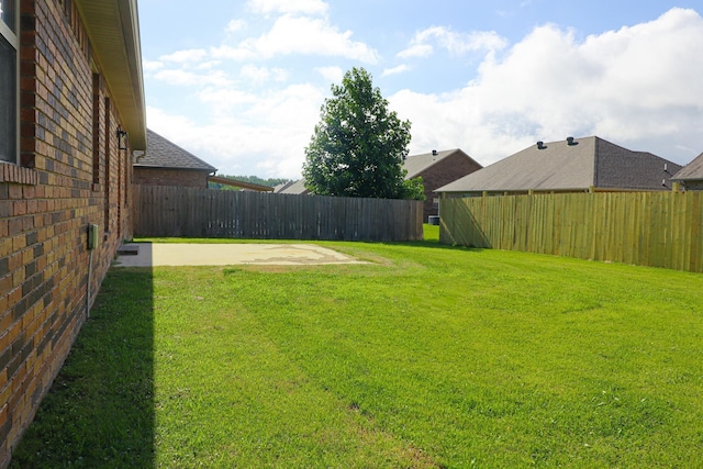 1206 Ryan Ln, Paragould, AR 72450 - fenced backyard with a patio area