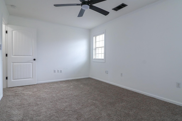 1206 Ryan Ln, Paragould, AR 72450 - empty room featuring ceiling fan, carpet floors, ornamental molding, and a smoke detector