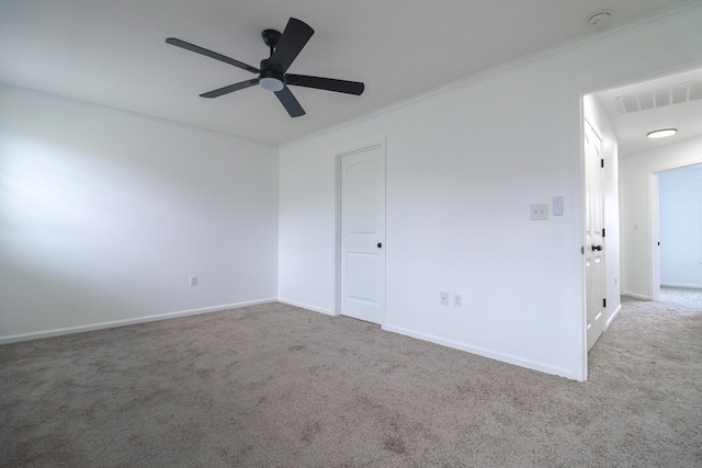 1206 Ryan Ln, Paragould, AR 72450 - carpeted empty room with a ceiling fan and ornamental molding