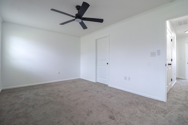 1206 Ryan Ln, Paragould, AR 72450 - carpeted empty room featuring a ceiling fan and crown molding