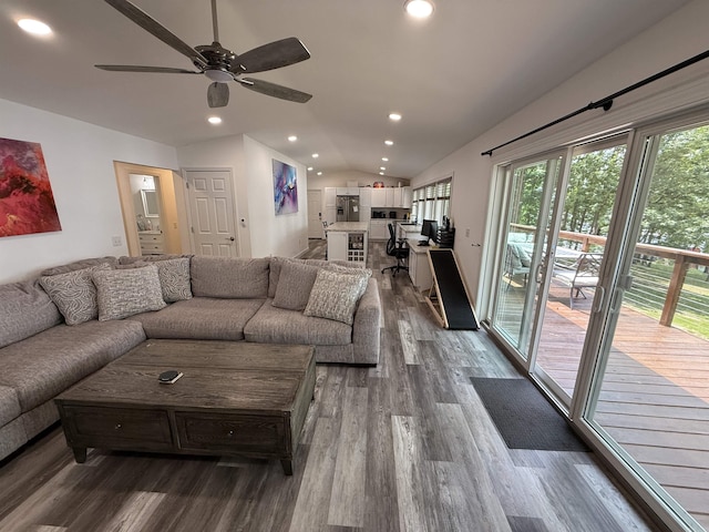 716 S Shore Dr, Horseshoe Bend, AR 72512 - living area featuring vaulted ceiling, dark wood finished floors, a ceiling fan, and recessed lighting