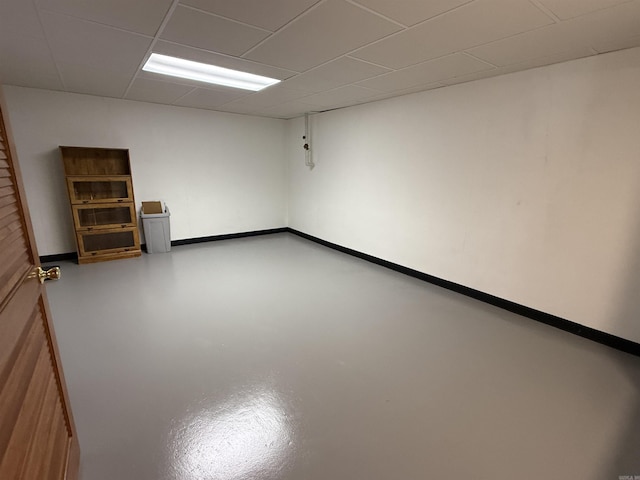 716 S Shore Dr, Horseshoe Bend, AR 72512 - empty room with a drop ceiling and finished concrete flooring