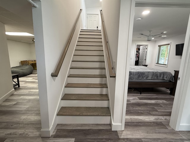 716 S Shore Dr, Horseshoe Bend, AR 72512 - stairs with wood finished floors and ceiling fan