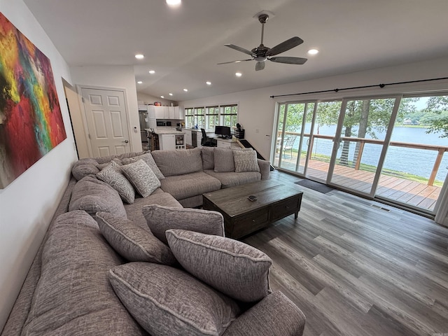 716 S Shore Dr, Horseshoe Bend, AR 72512 - living area with wood finished floors, recessed lighting, ceiling fan, and vaulted ceiling