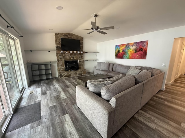 716 S Shore Dr, Horseshoe Bend, AR 72512 - living area featuring a ceiling fan, wood finished floors, vaulted ceiling, and a fireplace