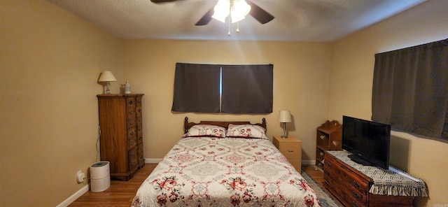 1000 Waverly Rd, Mountain Home, AR 72653 - bedroom featuring wood finished floors and a ceiling fan