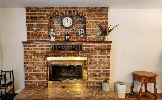 1000 Waverly Rd, Mountain Home, AR 72653 - detailed view of a brick fireplace and wood finished floors