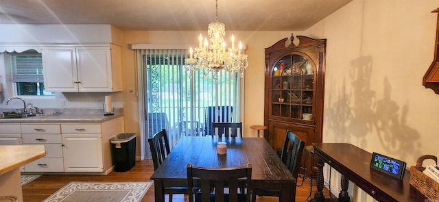 1000 Waverly Rd, Mountain Home, AR 72653 - dining space featuring a chandelier and dark wood-type flooring