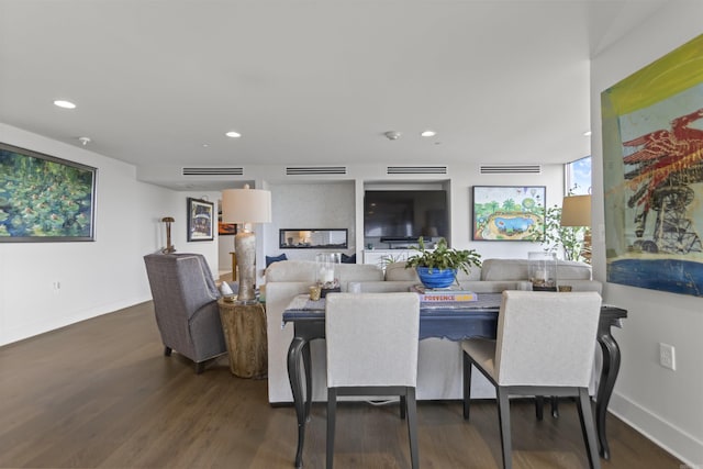 3700 Cantrell Rd Unit 1002, Little Rock, AR 72202 - living room featuring wood finished floors and recessed lighting