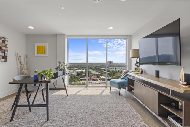 3700 Cantrell Rd Unit 1002, Little Rock, AR 72202 - living room featuring wood finished floors, recessed lighting, and floor to ceiling windows