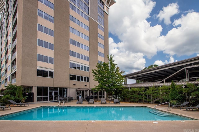 3700 Cantrell Rd Unit 1002, Little Rock, AR 72202 - community pool with a patio