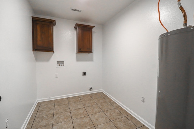 laundry area featuring cabinet space, water heater, light tile patterned floors, hookup for an electric dryer, and washer hookup