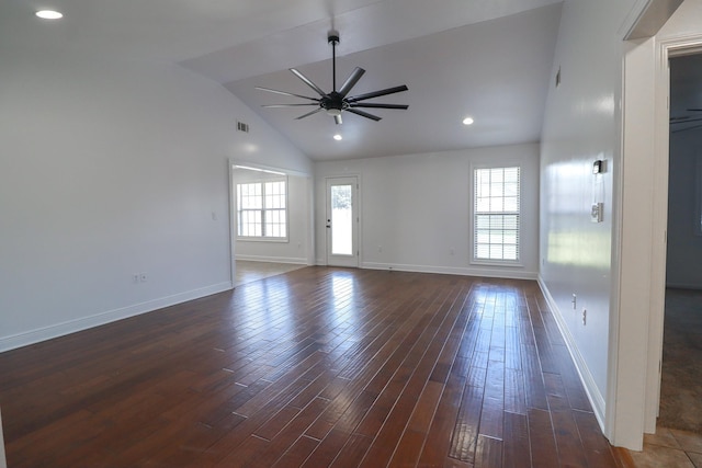 unfurnished living room with ceiling fan, dark wood-type flooring, and high vaulted ceiling