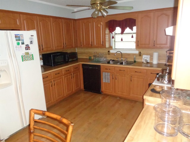 2 Wellington Ct, Little Rock, AR 72227 - kitchen with black appliances, light countertops, decorative backsplash, a ceiling fan, and crown molding