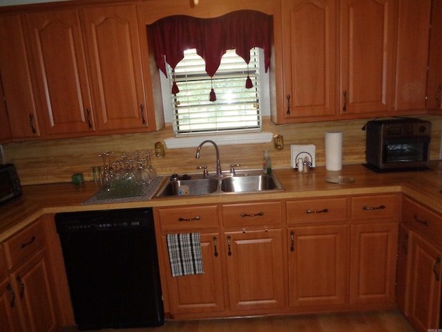 2 Wellington Ct, Little Rock, AR 72227 - kitchen featuring dishwasher, decorative backsplash, brown cabinetry, and light countertops