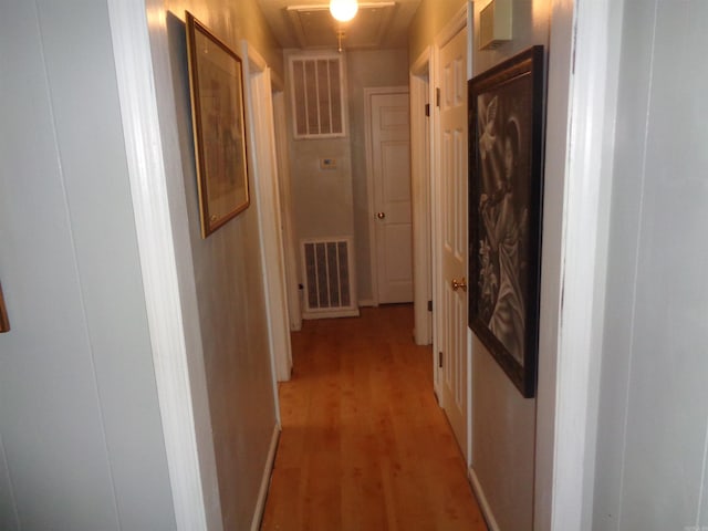 2 Wellington Ct, Little Rock, AR 72227 - hallway with light wood-style flooring and attic access