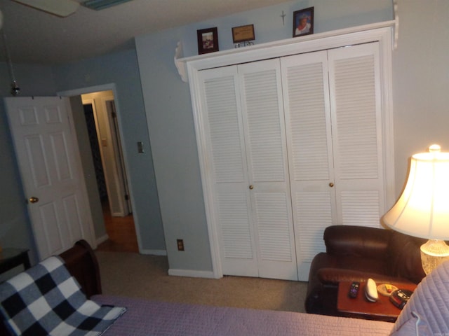 2 Wellington Ct, Little Rock, AR 72227 - carpeted bedroom with a closet and baseboards