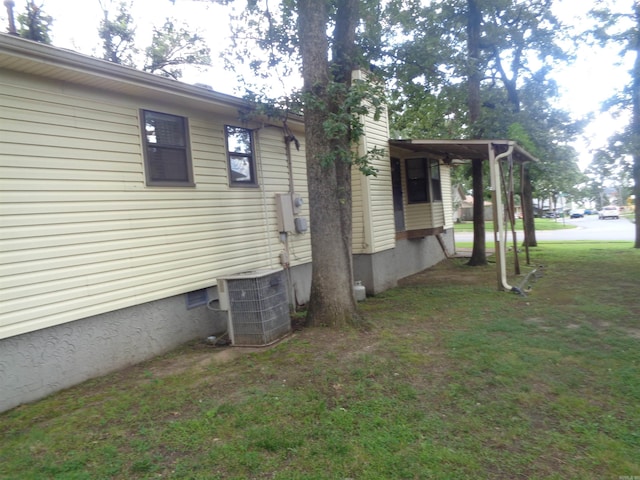 2 Wellington Ct, Little Rock, AR 72227 - view of home's exterior featuring a yard and a chimney