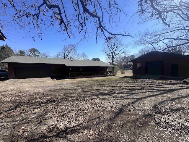 view of property exterior with a garage