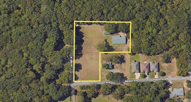 aerial view of property and surrounding area featuring property boundaries highlighted