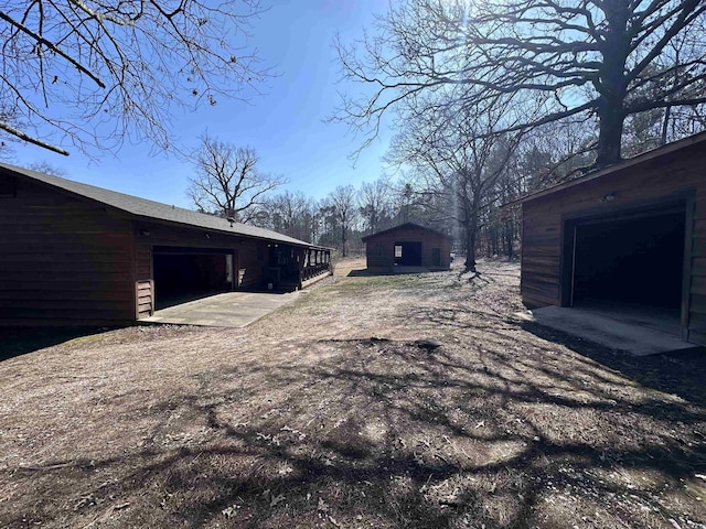 view of home's exterior featuring an outdoor structure