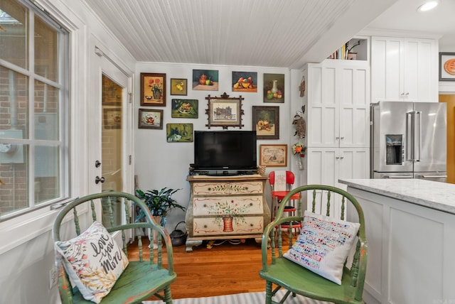 445 Midland St, Little Rock, AR 72205 - living area featuring wood finished floors, recessed lighting, and ornamental molding
