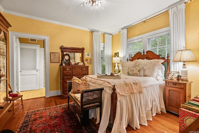 445 Midland St, Little Rock, AR 72205 - bedroom with crown molding and wood finished floors