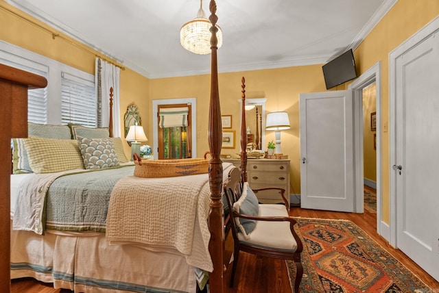 445 Midland St, Little Rock, AR 72205 - bedroom featuring crown molding and wood finished floors