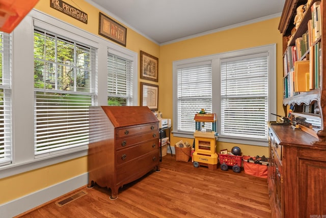 445 Midland St, Little Rock, AR 72205 - office featuring crown molding, light wood finished floors, and plenty of natural light