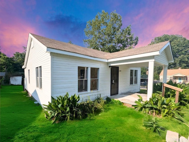 8200 W 34th St, Little Rock, AR 72204 - back of property with a lawn