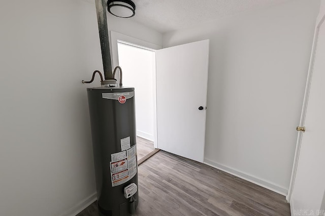 8200 W 34th St, Little Rock, AR 72204 - utility room featuring water heater