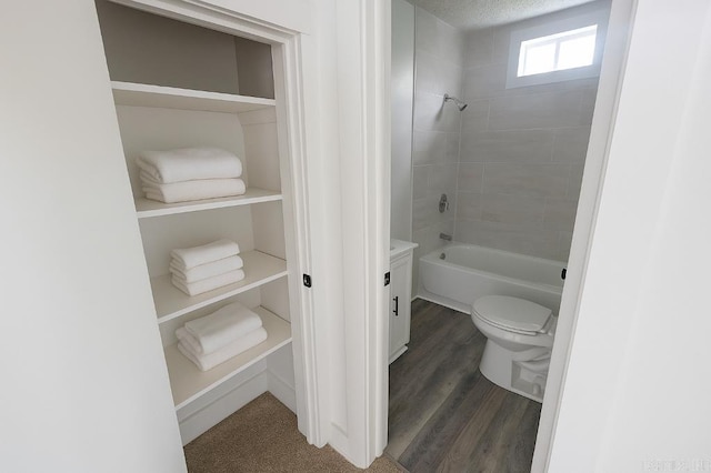 8200 W 34th St, Little Rock, AR 72204 - bathroom with shower / bath combination and wood finished floors